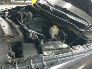 2014 Ram 1500 Express z VIN 3C6JR6AT5EG142019, wystawiony jako IAAI lot #42909966 z przebiegiem 136 943 mil mil oraz . Historia ofert i sprzedaży dostępna na DreamBid. Obrazek 19.