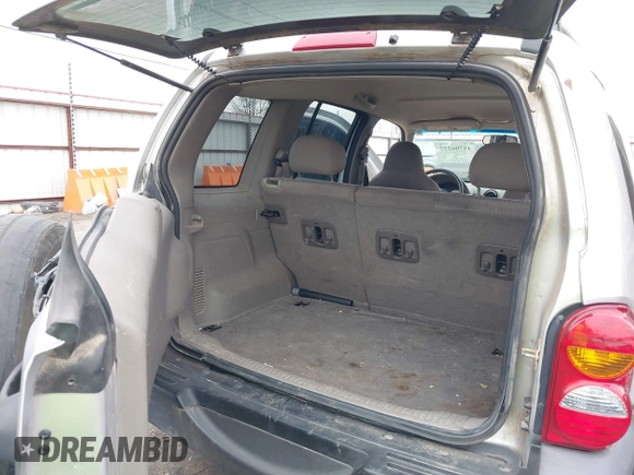 2004 Jeep Liberty Sport with VIN 1J4GL48K74W318861, listed as a IAAI auction lot 41706222 with 211,089 mi miles. Bid and sale history available at carsss.com. Image 17.