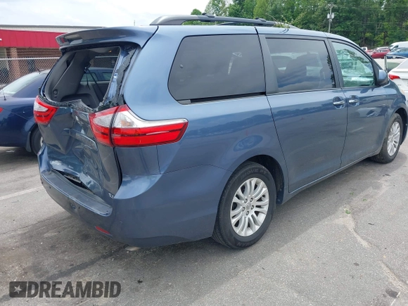 2015 Toyota Sienna XLE with VIN 5TDYK3DC3FS676919, listed as a IAAI auction lot 42475307 with 99,574 mi miles and . Bid and sale history available at DreamBid. Image 4.