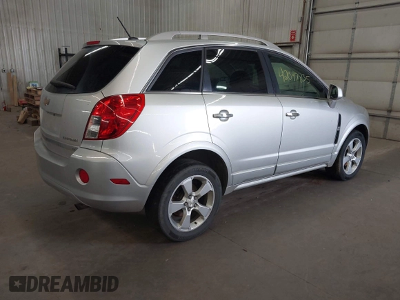 2015 Chevrolet Captiva Sport LT with VIN 3GNAL3EK2FS521222, listed as a IAAI auction lot 42097835 with 128,901 mi miles and . Bid and sale history available at carsss.com. Image 4.