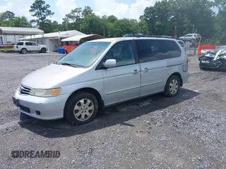 2002 Honda Odyssey EX z VIN 2HKRL18692H526842, wystawiony jako IAAI lot #42495810 z przebiegiem 220 289 mil mil oraz . Historia ofert i sprzedaży dostępna na DreamBid. Obrazek 2.