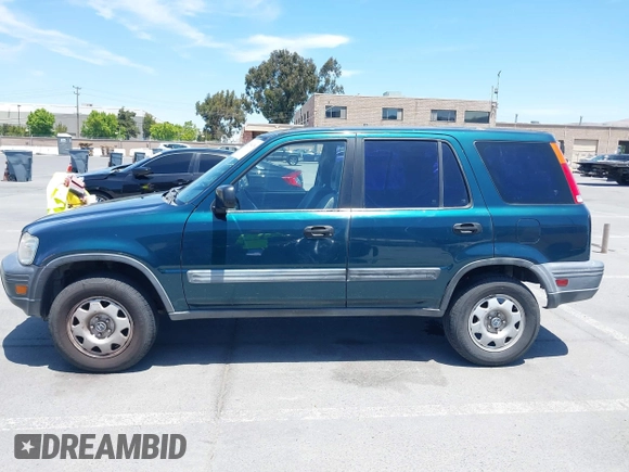 1998 Honda CR-V LX z VIN JHLRD1843WC083751, wystawiony jako IAAI lot #42356438 z przebiegiem 167 342 mil mil oraz . Historia ofert i sprzedaży dostępna na DreamBid. Obrazek 14.
