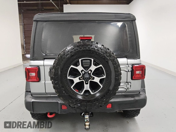 2021 Jeep Wrangler Unlimited Rubicon with VIN 1C4HJXFGXMW694860, listed as a Copart auction lot 58929725 with 29,172 mi miles and Clean title. Bid and sale history available at DreamBid. Image 6.