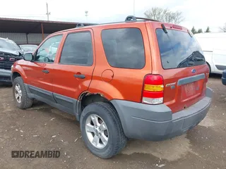 2006 Ford Escape XLT with VIN 1FMYU03126KA17323, listed as a IAAI auction lot 42048363 with 119,296 mi miles and . Bid and sale history available at DreamBid. Image 3.