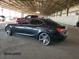 2015 Maserati Ghibli z VIN ZAM57XSA2F1146396, wystawiony jako Copart lot #56568585 z przebiegiem 85 556 mil mil oraz Szkoda całkowita • Salvage title. Historia ofert i sprzedaży dostępna na DreamBid. Obrazek 2.