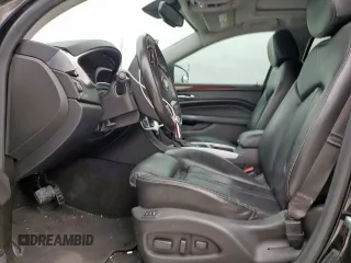 2016 Cadillac SRX Luxury Collection with VIN 3GYFNBE33GS513010, listed as a Copart auction lot 53452665 with 83,811 mi miles and Salvage title. Bid and sale history available at DreamBid. Image 7.