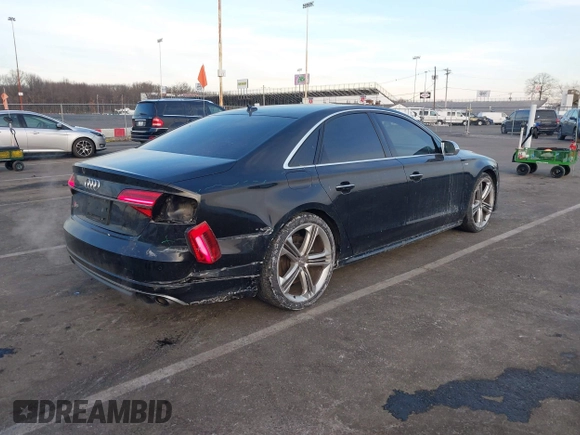 2015 Audi S8 with VIN WAUK2AFD5FN027013, listed as a IAAI auction lot 41456289 with 77,877 mi miles. Bid and sale history available at carsss.com. Image 4.