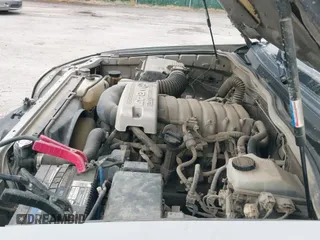 2003 Toyota 4Runner SR5 z VIN JTEBT14R730004853, wystawiony jako IAAI lot #43040943 z przebiegiem 262 826 mil mil oraz . Historia ofert i sprzedaży dostępna na DreamBid. Obrazek 13.