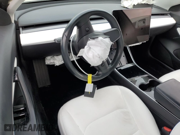 2019 Tesla Model 3 Mid Range z VIN 5YJ3E1EAXKF429382, wystawiony jako Copart lot #56172625 z przebiegiem Nie podano mil oraz Szkoda całkowita • Salvage title. Historia ofert i sprzedaży dostępna na DreamBid. Obrazek 8.