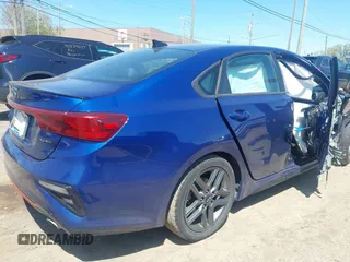 2021 Kia Forte GT-Line z VIN 3KPF34AD6ME284046, wystawiony jako IAAI lot #42231501 z przebiegiem 97 877 mil mil oraz . Historia ofert i sprzedaży dostępna na DreamBid. Obrazek 6.