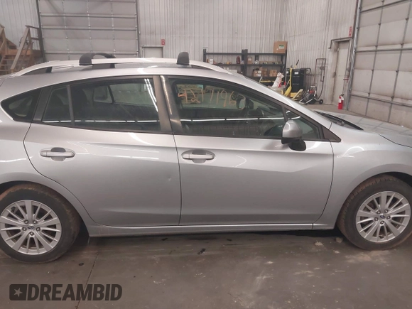 2017 Subaru Impreza Premium with VIN 4S3GTAB67H3740524, listed as a IAAI auction lot 42171963 with 148,495 mi miles and . Bid and sale history available at DreamBid. Image 14.
