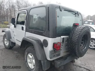 2006 Jeep Wrangler X with VIN 1J4FA39SX6P709588, listed as a IAAI auction lot 41927435 with 227,990 mi miles. Bid and sale history available at carsss.com. Image 3.