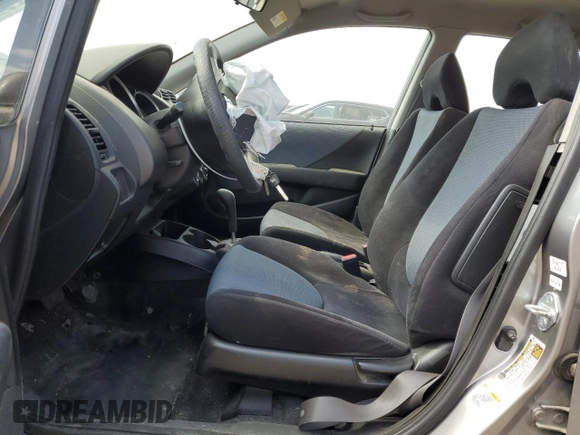 2007 Honda Fit z VIN JHMGD38497S025472, wystawiony jako Copart lot #55901095 z przebiegiem 120 216 mil mil oraz Szkoda całkowita • Salvage title. Historia ofert i sprzedaży dostępna na DreamBid. Obrazek 7.