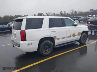 2019 Chevrolet Tahoe Commercial with VIN 1GNLCDEC4KR198330, listed as a IAAI auction lot 41542971 with 94,171 mi miles. Bid and sale history available at carsss.com. Image 4.