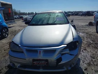 2003 Pontiac Grand Am GT with VIN 1G2NW52E13M612218, listed as a IAAI auction lot 41478495 with 242,179 mi miles. Bid and sale history available at carsss.com. Image 13.