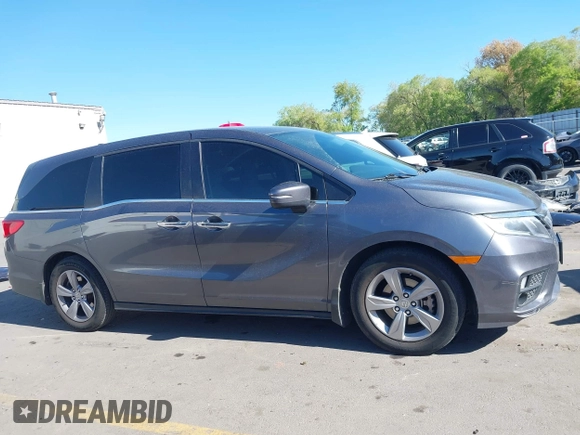 2018 Honda Odyssey EX-L z VIN 5FNRL6H7XJB067694, wystawiony jako IAAI lot #42177338 z przebiegiem 159 670 mil mil oraz . Historia ofert i sprzedaży dostępna na DreamBid. Obrazek 14.