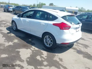 2015 Ford Focus SE with VIN 1FADP3K21FL246601, listed as a IAAI auction lot 41985398 with 139,782 mi miles. Bid and sale history available at carsss.com. Image 3.