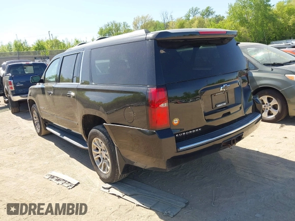 2016 Chevrolet Suburban LTZ with VIN 1GNSKJKC5GR328723, listed as a IAAI auction lot 42253610 with 183,423 mi miles and . Bid and sale history available at DreamBid. Image 3.