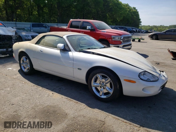 1999 Jaguar XK with VIN SAJGX2043XC040866, listed as a Copart auction lot 53712555 with 65,349 mi miles and Clean Title. Bid and sale history available at DreamBid. Image 4.