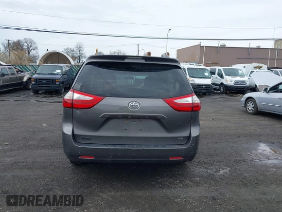 2015 Toyota Sienna LE AAS with VIN 5TDKK3DC1FS615090, listed as a IAAI auction lot 41965112 with 116,745 mi miles. Bid and sale history available at carsss.com. Image 16.
