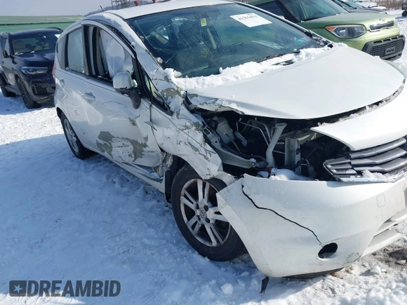 2014 Nissan Note S with VIN 3N1CE2CP0EL437674, listed as a IAAI auction lot 41351411 with 125,249 mi miles and . Bid and sale history available at DreamBid. Image 6.