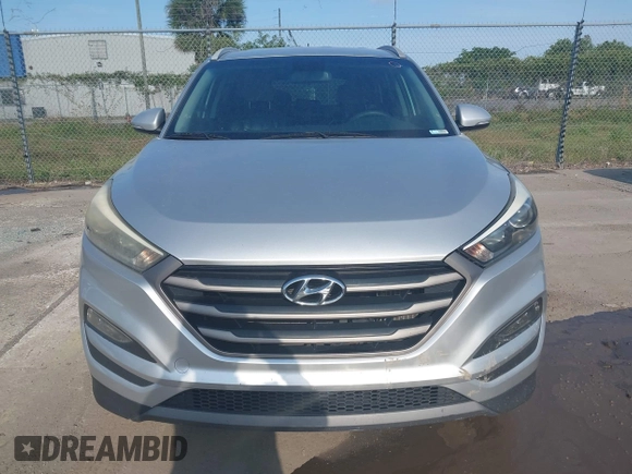 2016 Hyundai Tucson Limited with VIN KM8J33A25GU227907, listed as a IAAI auction lot 42211605 with 142,578 mi miles. Bid and sale history available at carsss.com. Image 12.