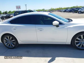 2021 Mazda 6 Touring with VIN JM1GL1VM4M1618686, listed as a IAAI auction lot 42079730 with 55,539 mi miles and . Bid and sale history available at DreamBid. Image 13.