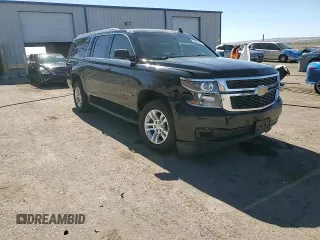 2019 Chevrolet Suburban LS with VIN 1GNSCGKC6KR180042, listed as a Copart auction lot 76829394 with 75,574 mi miles and Salvage title. Bid and sale history available at DreamBid. Image 14.
