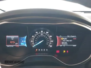 2016 Ford Fusion Titanium z VIN 3FA6P0K95GR119017, wystawiony jako IAAI lot #42148460 z przebiegiem 84 770 mil mil oraz . Historia ofert i sprzedaży dostępna na DreamBid. Obrazek 7.