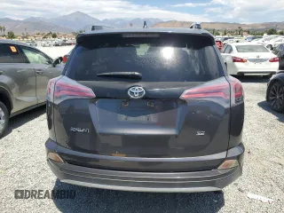 2016 Toyota RAV4 SE with VIN JTMNFREV2GJ072643, listed as a Copart auction lot 63879695 with 104,118 mi miles and Salvage title. Bid and sale history available at DreamBid. Image 6.