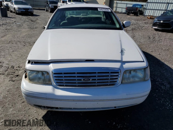 2000 Ford Crown Victoria LX z VIN 2FAFP74W0YX125595, wystawiony jako Copart lot #84675434 z przebiegiem 151 438 mil mil oraz Szkoda całkowita • Salvage title. Historia ofert i sprzedaży dostępna na DreamBid. Obrazek 5.