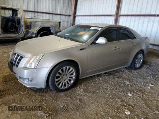 2013 Cadillac CTS Performance with VIN 1G6DK5E30D0157791, listed as a Copart auction lot 83798544 with 124,638 mi miles and Salvage Title. Bid and sale history available at DreamBid. Image 1.