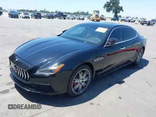 2018 Maserati Quattroporte S GranLusso z VIN ZAM56YPL1J1274060, wystawiony jako IAAI lot #42347208 z przebiegiem 55 022 mil mil oraz . Historia ofert i sprzedaży dostępna na DreamBid. Obrazek 2.