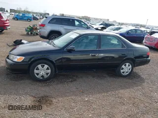 2001 Toyota Camry CE with VIN JT2BG22K910548345, listed as a IAAI auction lot 41723835 with 170,228 mi miles and . Bid and sale history available at DreamBid. Image 15.