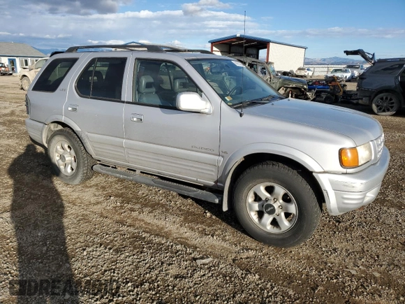 1999 Isuzu Rodeo S z VIN 4S2CM58W8X4339006, wystawiony jako Copart lot #84285294 z przebiegiem 129 191 mil mil oraz Czysty tytuł • Clean title. Historia ofert i sprzedaży dostępna na DreamBid. Obrazek 4.