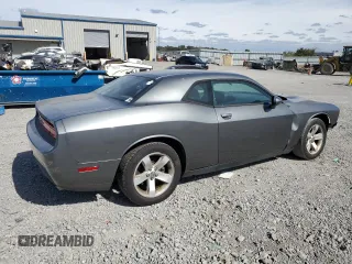2011 Dodge Challenger z VIN 2B3CJ4DG9BH570202, wystawiony jako Copart lot #73284844 z przebiegiem 217 850 mil mil oraz Szkoda całkowita • Salvage title. Historia ofert i sprzedaży dostępna na DreamBid. Obrazek 3.