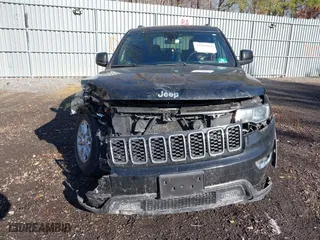 2018 Jeep Grand Cherokee Laredo E with VIN 1C4RJFAG4JC326631, listed as a IAAI auction lot 41191061 with 115,451 mi miles. Bid and sale history available at carsss.com. Image 12.