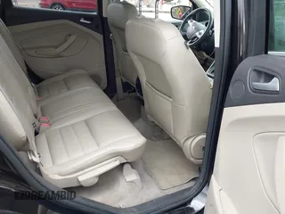 2013 Ford Escape SEL z VIN 1FMCU9H98DUB78564, wystawiony jako IAAI lot #42381290 z przebiegiem 89 728 mil mil oraz . Historia ofert i sprzedaży dostępna na DreamBid. Obrazek 8.