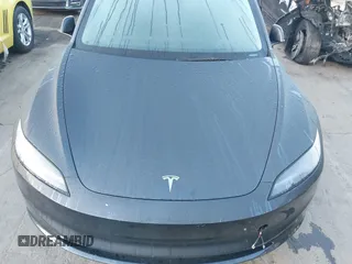 2025 Tesla Model 3 Long Range with VIN 5YJ3E1EA1SF877851, listed as a IAAI auction lot 41917772 with 2,313 mi miles and . Bid and sale history available at carsss.com. Image 10.