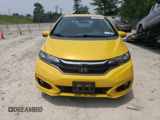 2018 Honda Fit EX с VIN 3HGGK5H89JM717562, выставлен на аукционе Copart как лот 60090475 с пробегом 70 544 миль миль и Списание • Salvage title. История ставок и продаж доступна на DreamBid. Изображение 5.