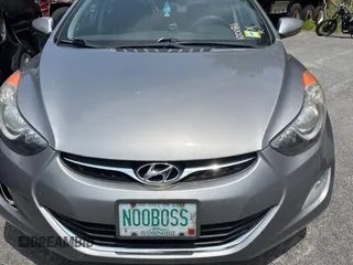 2012 Hyundai Elantra Limited z VIN KMHDH4AE6CU422133, wystawiony jako Copart lot #61023095 z przebiegiem 141 500 mil mil oraz Czysty tytuł • Clean title. Historia ofert i sprzedaży dostępna na DreamBid. Obrazek 9.