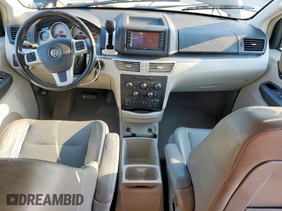 2012 Volkswagen Routan SE with VIN 2C4RVABG9CR293738, listed as a Copart auction lot 56408455 with 123,546 mi miles and Clean title. Bid and sale history available at DreamBid. Image 8.
