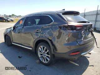 2018 Mazda CX-9 Grand Touring with VIN JM3TCADY5J0200052, listed as a Copart auction lot 55160715 with 68,464 mi miles and Salvage title. Bid and sale history available at DreamBid. Image 2.