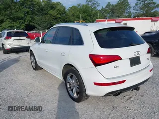 2015 Audi Q5 Premium Plus z VIN WA1DGAFPXFA054099, wystawiony jako IAAI lot #42192489 z przebiegiem 106 560 mil mil oraz . Historia ofert i sprzedaży dostępna na DreamBid. Obrazek 3.