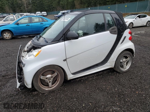 2013 Smart fortwo Passion z VIN WMEEK3BAXDK659870, wystawiony jako Copart lot #86387504 z przebiegiem 72 638 mil mil oraz Szkoda całkowita • Salvage title. Historia ofert i sprzedaży dostępna na DreamBid. Obrazek 1.