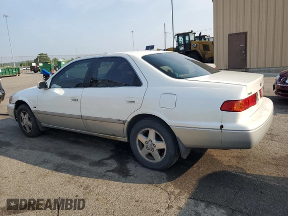 2001 Toyota Camry LE z VIN JT2BF22K010297055, wystawiony jako Copart lot #59510645 z przebiegiem 265 428 mil mil oraz Szkoda całkowita • Salvage title. Historia ofert i sprzedaży dostępna na DreamBid. Obrazek 2.