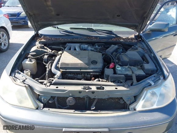 2004 Toyota Avalon XL with VIN 4T1BF28B24U342374, listed as a IAAI auction lot 42042336 with 250,984 mi miles. Bid and sale history available at carsss.com. Image 10.