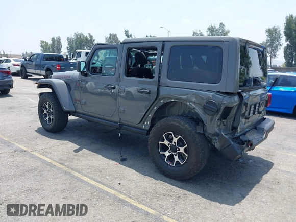 2020 Jeep Wrangler Unlimited Rubicon with VIN 1C4HJXFG3LW279636, listed as a IAAI auction lot 42430354 with 19,631 mi miles and . Bid and sale history available at DreamBid. Image 3.