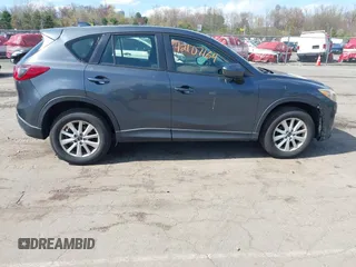 2013 Mazda CX-5 Sport with VIN JM3KE4BE7D0164398, listed as a IAAI auction lot 42107164 with 166,852 mi miles. Bid and sale history available at carsss.com. Image 13.