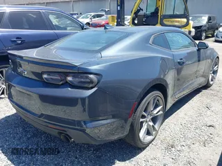2020 Chevrolet Camaro 1LT with VIN 1G1FA1RX4L0140613, listed as a IAAI auction lot 41577677 with 30,571 mi miles and . Bid and sale history available at carsss.com. Image 4.